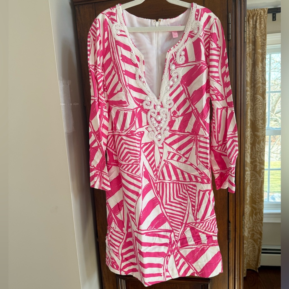 Pink and white knee length dress
